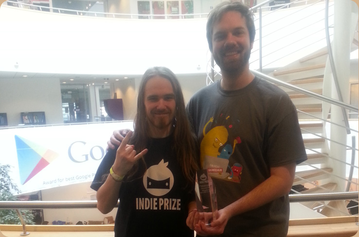 Jeff Jensen and Martin Bruun Pedersen flashing their "MOST PROMISING GAME IN DEVELOPMENT" award, 2014